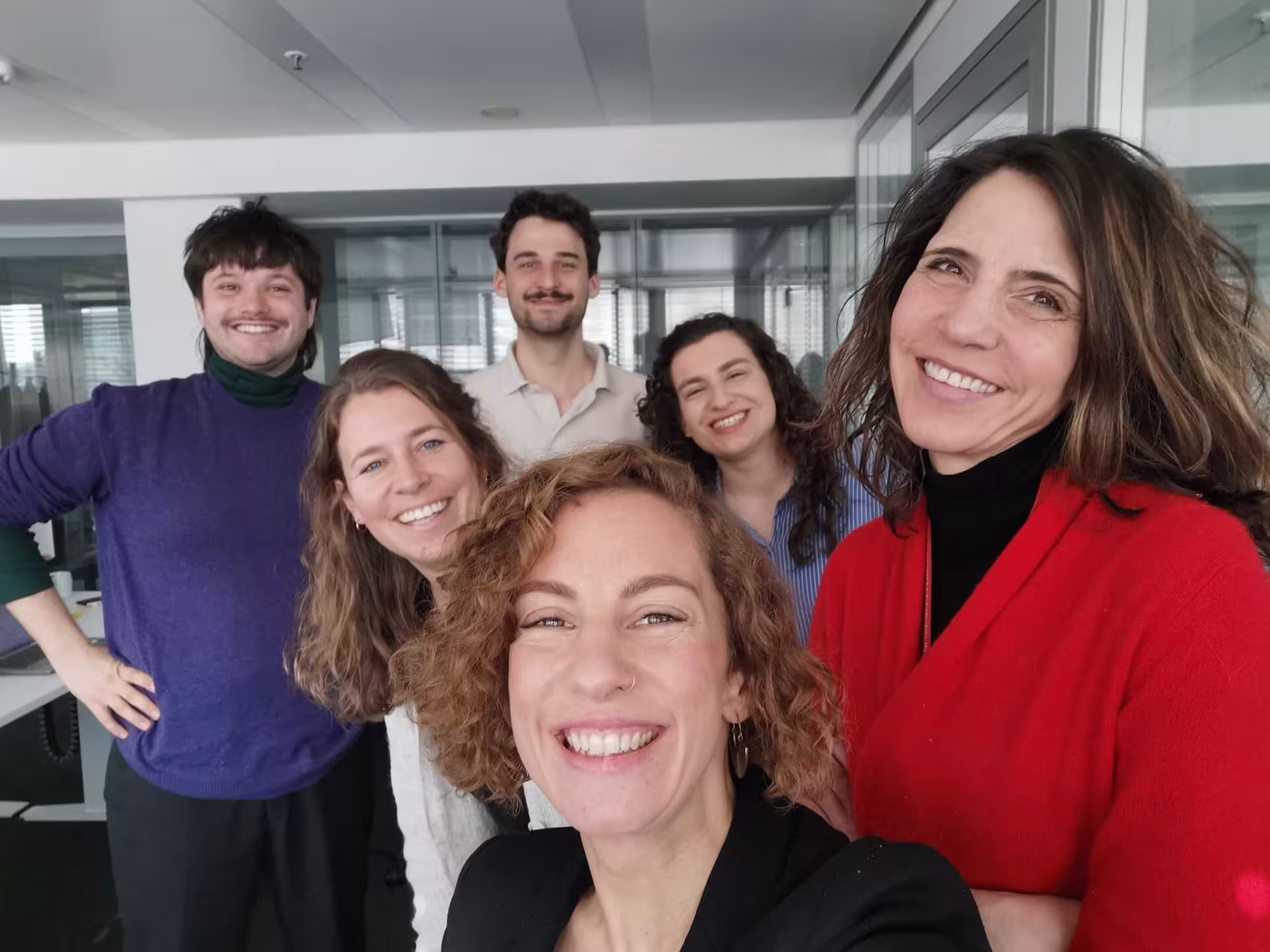 Six people are smiling
